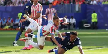 Soccer Football - FIFA World Cup 2026 - Round of 16 - Paraguay v France - Philadelphia Stadium, Philadelphia, Pennsylvania, U.S. - July 4, 2026 France's Kylian Mbappe in action with Paraguay's Juan Jose Caceres IMAGN IMAGES via Reuters/Bill Streicher
